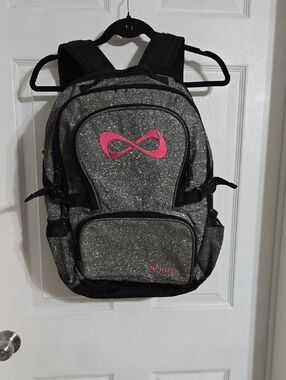 NFINITY Silver Glitter Backpack with Pink Infinity Accent